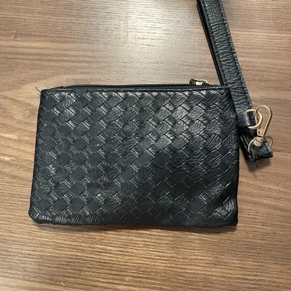 Small Black Pattern Wristlet With Zipper & Metal Clasp Closure.